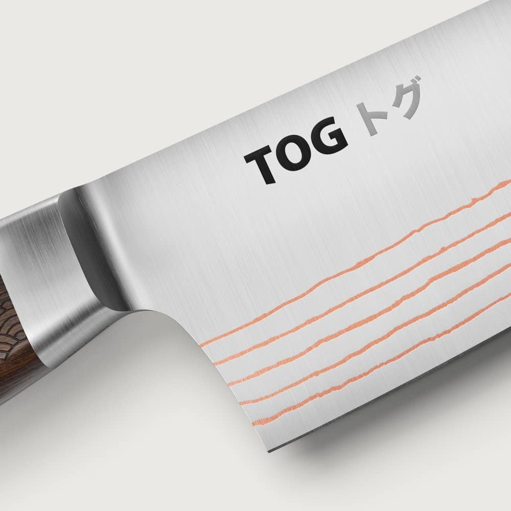 Una lama di un coltello TOG con le linee di rame