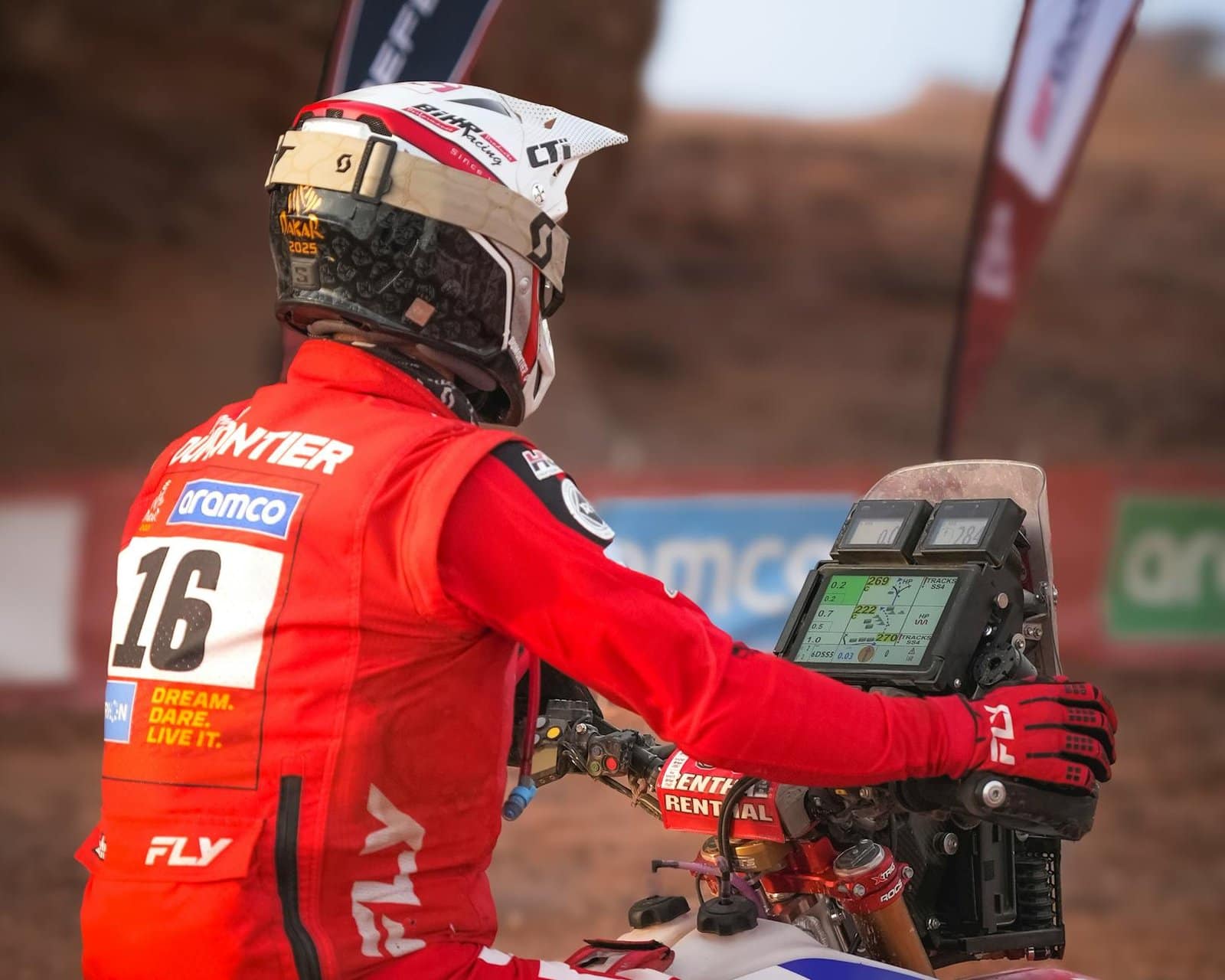 motorcyclist with gps at rally event