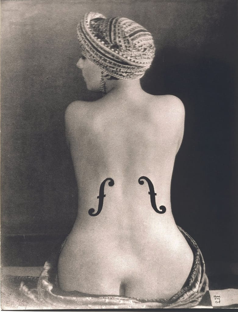 3. Man Ray. Le Violon d’Ingres, 1924 circa, stampa in bianco e nero alla gelatina d’argento, 39 x 29.5 cm. Ristampa 1976.Courtesy Archivio Storico della Biennale di Venezia - ASAC, Venezia © Man Ray Trust by SIAE 2023
